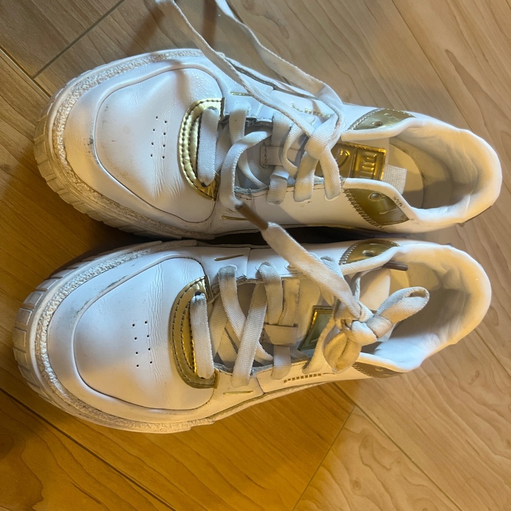 PUMA White and Gold Sneakers